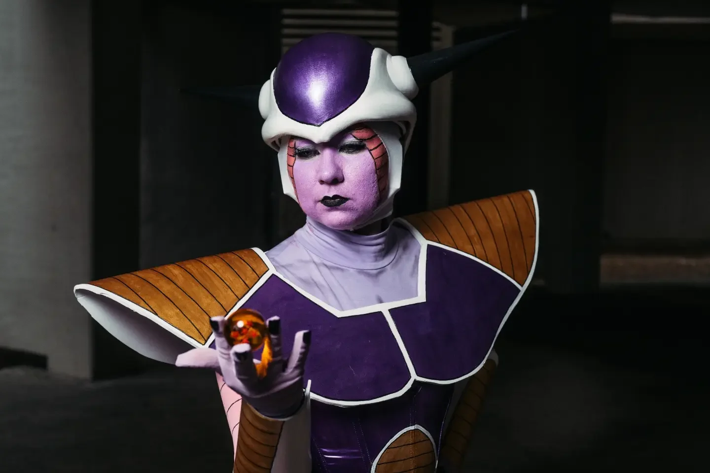 Mariah in her finished first-form Frieza cosplay, wearing the white and purple helmet with black horns